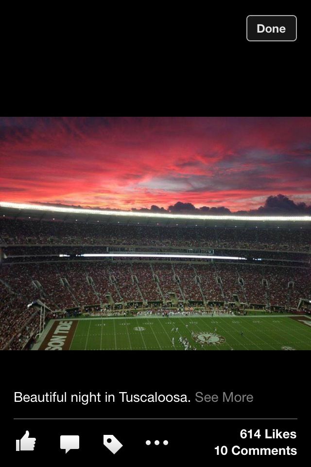 an image of a football stadium at sunset