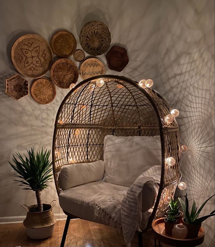 a living room filled with furniture and lots of lights on the wall next to it