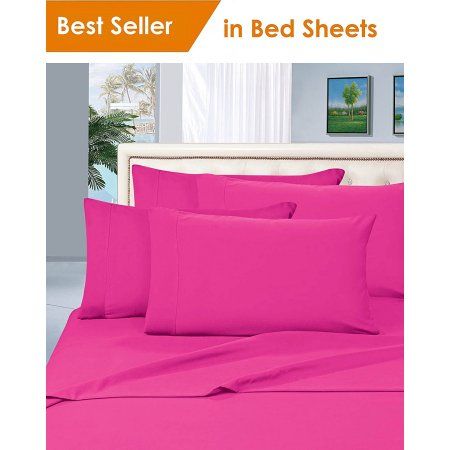 the bed sheets are bright pink and have been set up with matching pillow cases for comfort