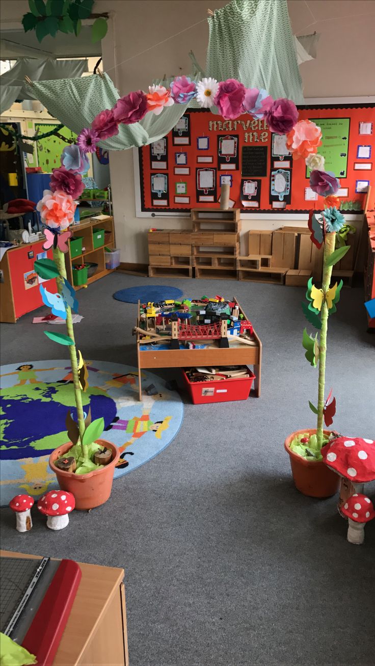 the classroom is decorated with colorful paper flowers