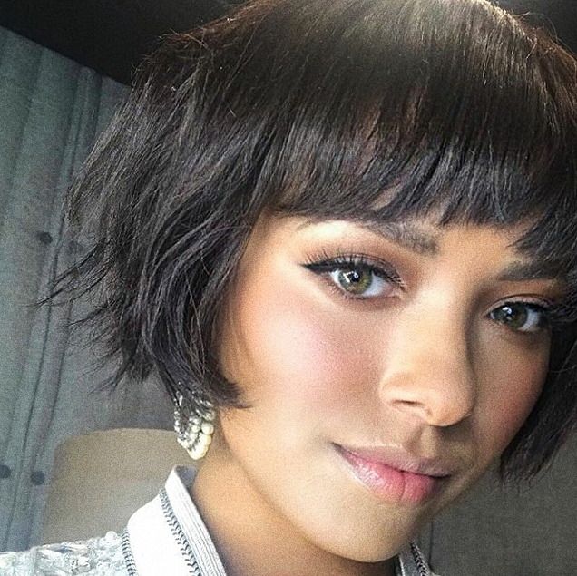 a close up of a person with short hair