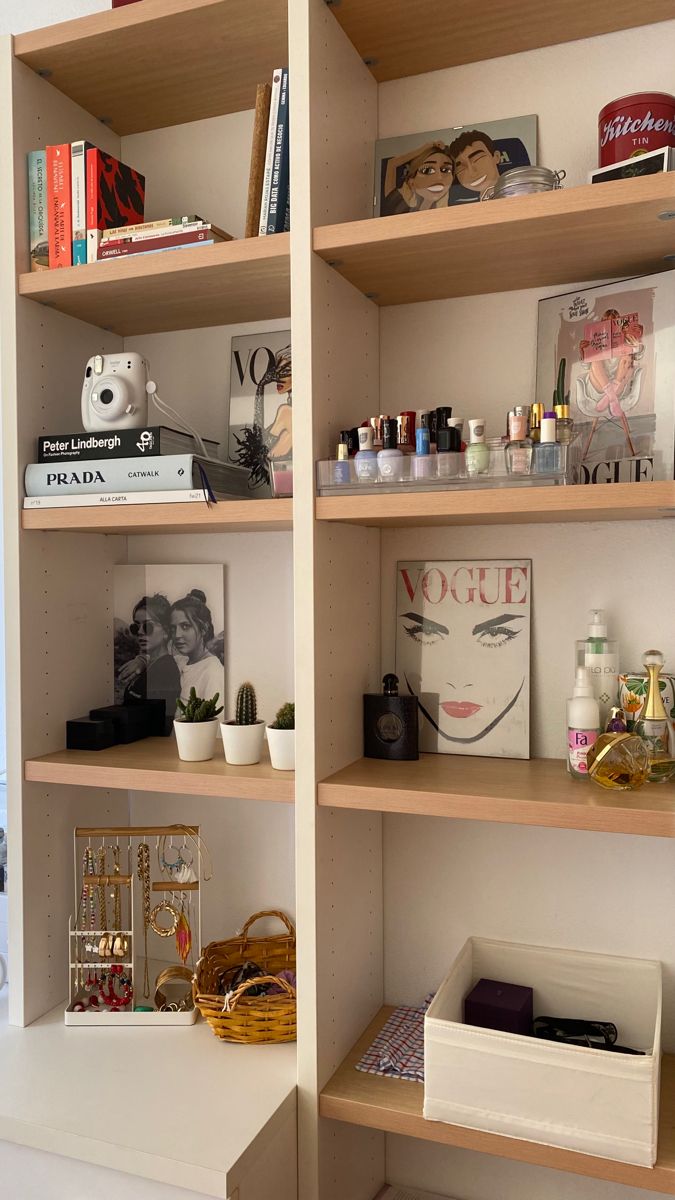 the shelves in this room are filled with books and other things to use for makeup