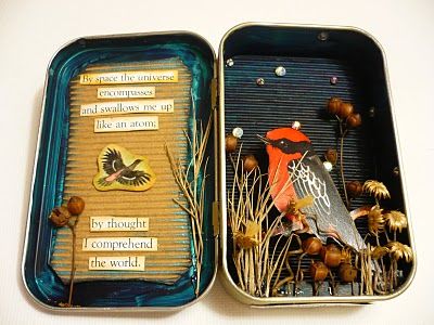 an open tin can with a bird on it and some words in the bottom half