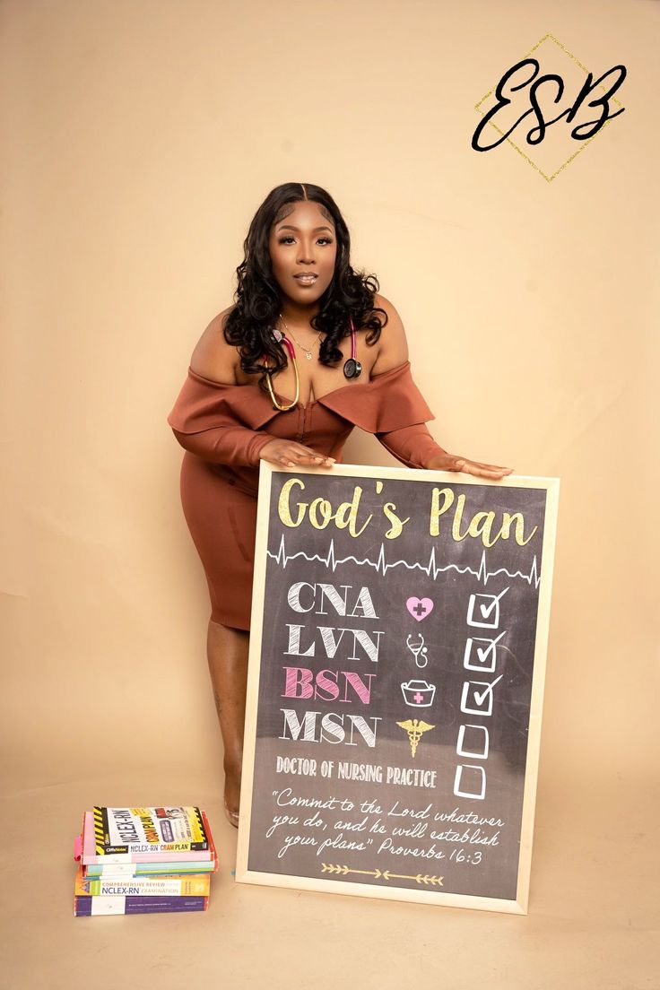 a woman holding a sign that says god's plan on it and posing for the camera