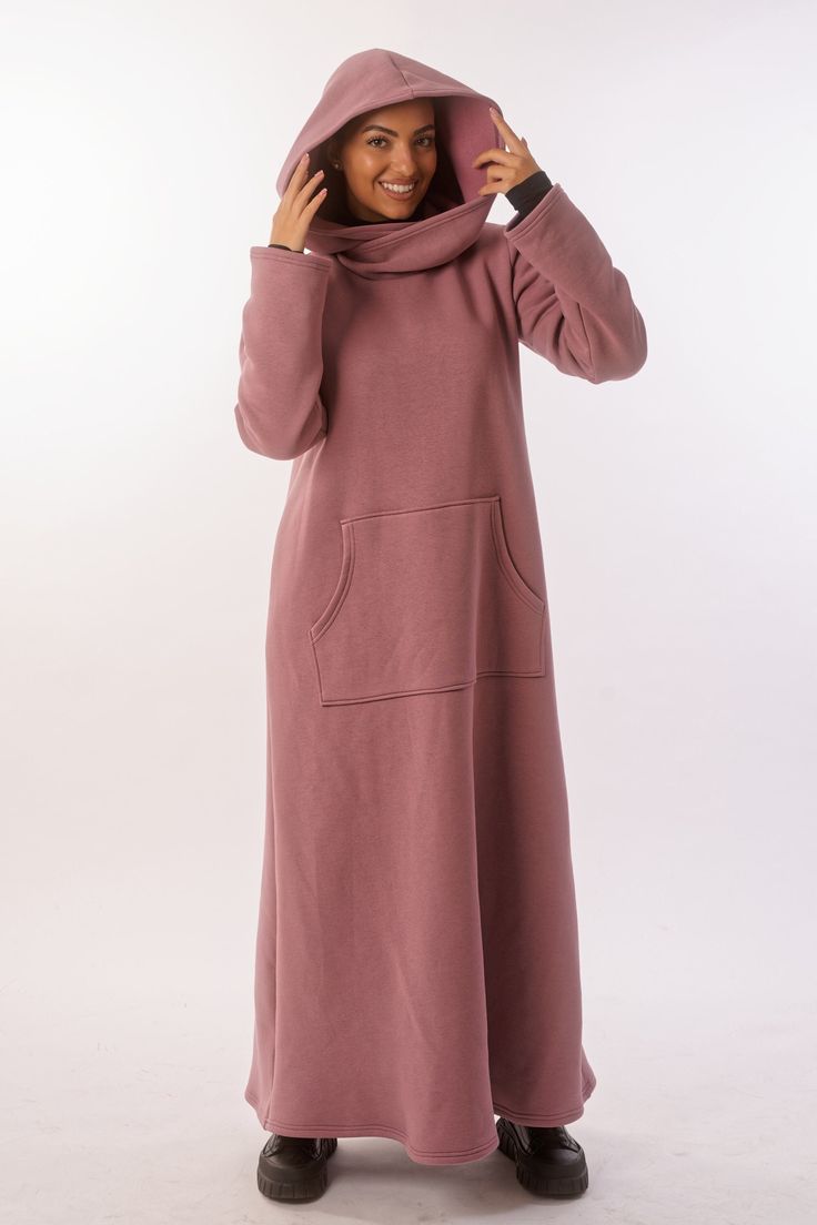 "Long outer winter dress with hood and front pocket made of cotton fleece, very comfortable and practical for every day. This cape you can throw on top of pajamas and go out to the store or for a walk. ● The model is 5,9\"( 175sm) ● The model is a M ➤ Sizing SIZE CHART (cm/inch) XS-bust 85/33.5, waist 66/26, hips 91/35.8 S-bust 90/35.5, waist 71/28, hips 97/38 M-bust 95/37.4, waist 76/30, hips 102/40 L-bust 102/40, waist 83/32.7, hips 109/43 XL-bust 109/43, waist 90/35.5, hips 116/45.5 2XL-bust Dresses For The Cold Weather, Winterize Maxi Dress, Long Hoodie Uk, Hoodie Dress Elegant, Hoodie Dress Plus Size, Maxi Dress Hoodie, Maxi Dress Wool, Long Winter Maxi Dress, Long Sleeve Dress Cold Weather