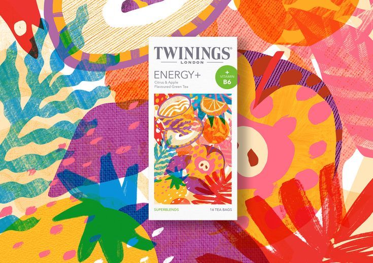 a box of twinings energy - glye on a colorful background with flowers and leaves