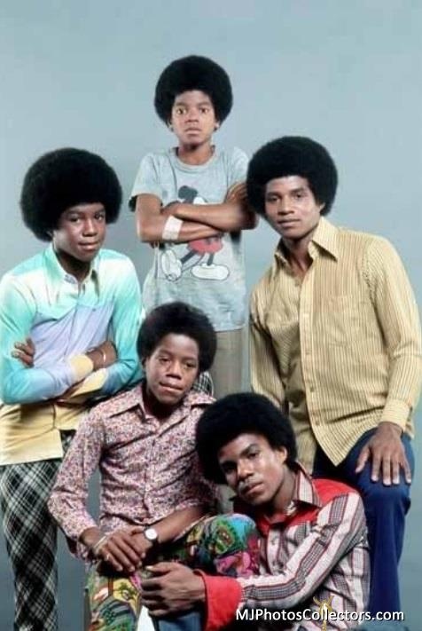 the jacksons are posing for a photo