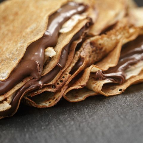 there is a stack of tortillas with chocolate on top