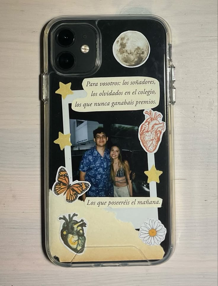 a cell phone case with an image of two people and butterflies on the back cover