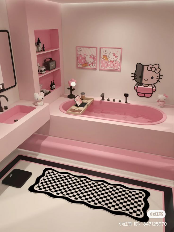 a hello kitty bathroom with pink tub and black and white rug