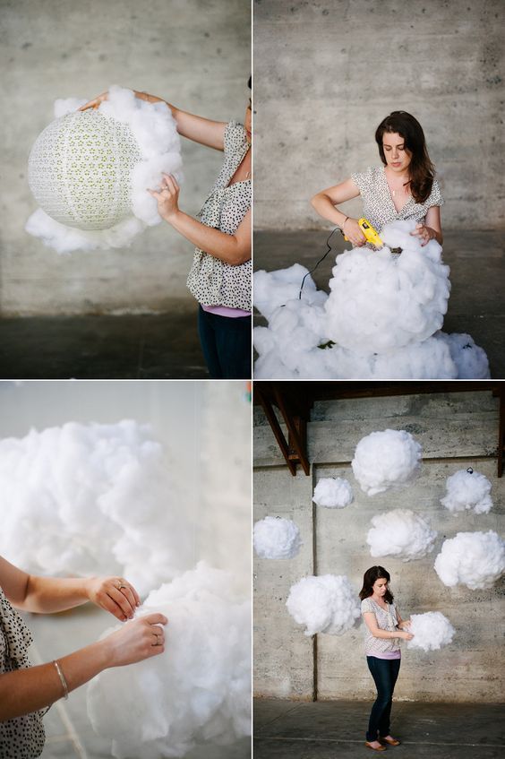 a woman is holding cotton balls in her hands