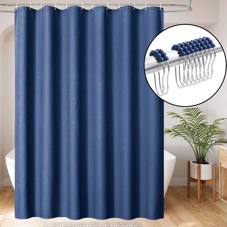 a blue shower curtain with two hooks on it and a plant in the corner next to it