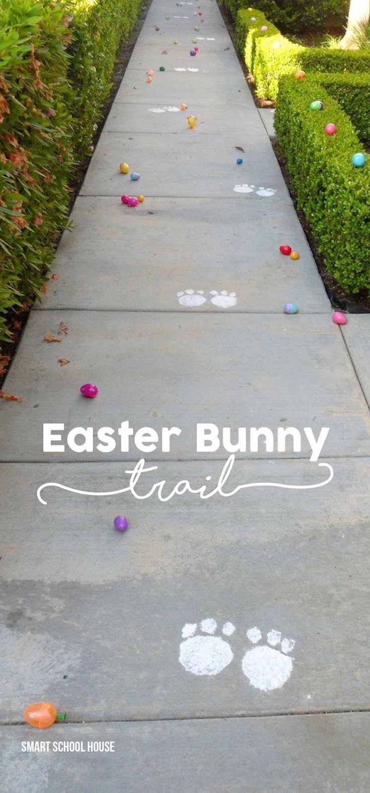 an easter bunny trail is painted on the sidewalk with colored eggs and paw prints in it