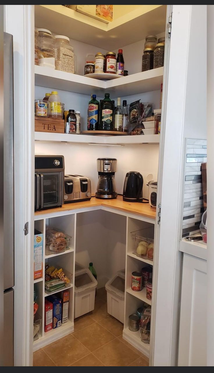 an open pantry with lots of food in it