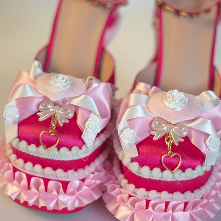 Step into a world of whimsical elegance with our high heel platform shoes, a perfect blend of lolita and kawaii fashion. These shoes are a statement piece, featuring a charming array of bows, floral patterns, and heart decorations that exude a playful yet sophisticated vibe. The heart charms add a touch of romance, while the rhinestone-encrusted buckle strap sparkles with every step you take. The heels and platforms are not just for height but are beautifully decorated, ensuring that these shoes Cute Kawaii Shoes, Gyaru Shoes, Cottagecore Shoes, Dream Heels, Heart Heels, Strap Up Heels, Princess Heels, Heel Platforms, Muses Shoes