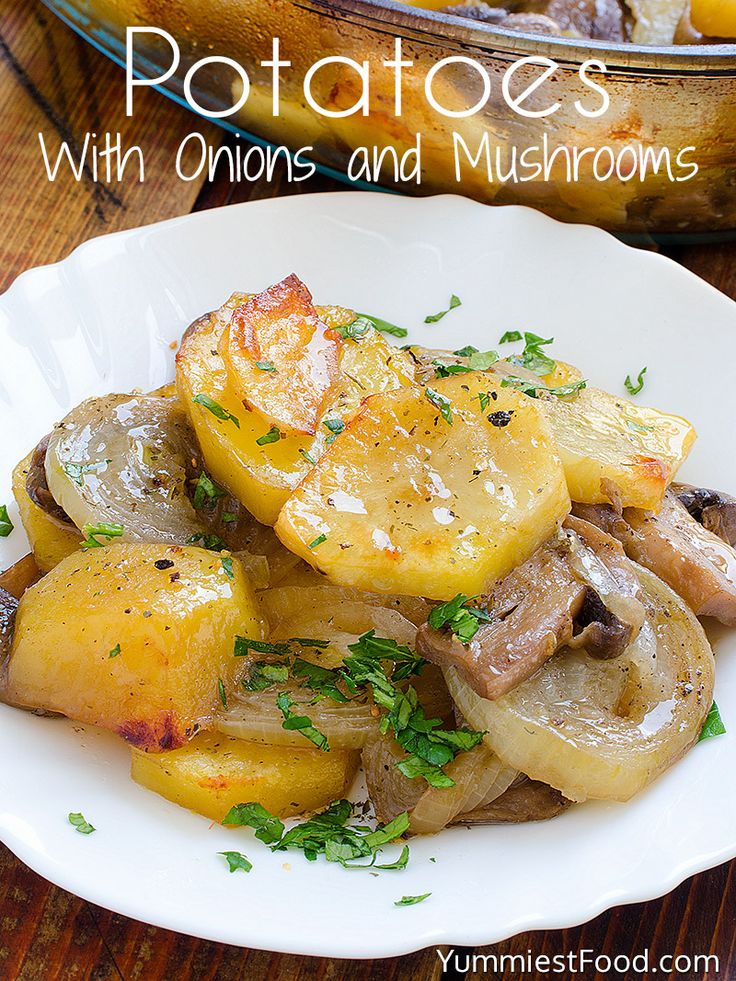 potatoes with onions and mushrooms on a white plate