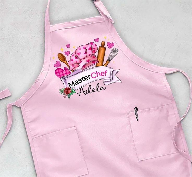 a pink apron with the words master chef aleella on it and two spoons