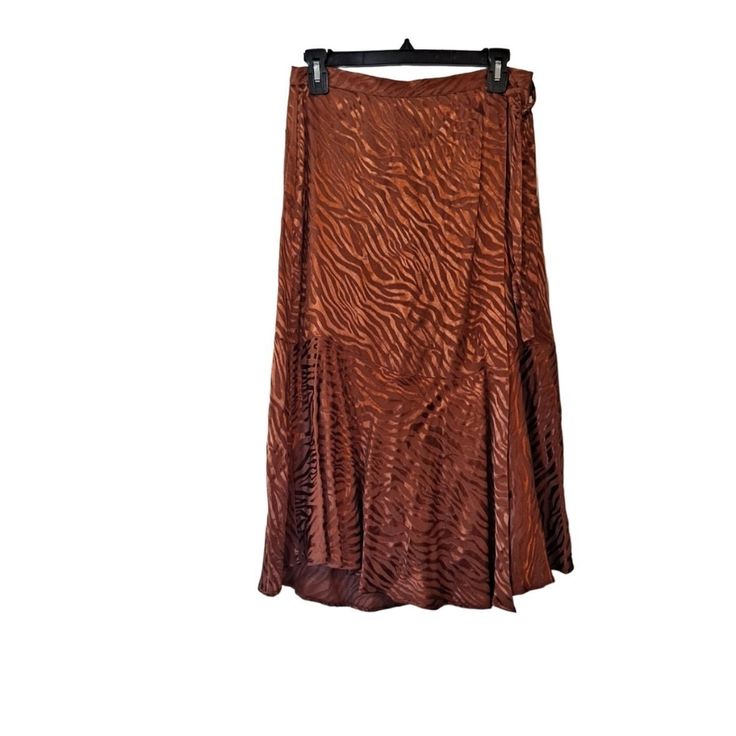 Maeve By Anthropologie Bronze Faux Wrap Midi Skirt Size 8 Size: 8 Colors: Bronze, Copper Color Description: Beautiful Skirt Animal Pattern Lined Side Partial Wrap Detail Satin Look Material: Lining 100% Viscose Shell 100% Viscose Measurements: Length 31" Waist 30" Condition: Nwt (New With Tags) I Love Offers Bundle And Save I Ship Daily -220- Midi Flowy Skirt, Tan Midi Skirt, Petite Midi Skirt, Zara Pleated Skirt, Satin Pleated Skirt, Jean Midi Skirt, Fitted Midi Skirt, Wrap Midi Skirt, Sequin Midi Skirt