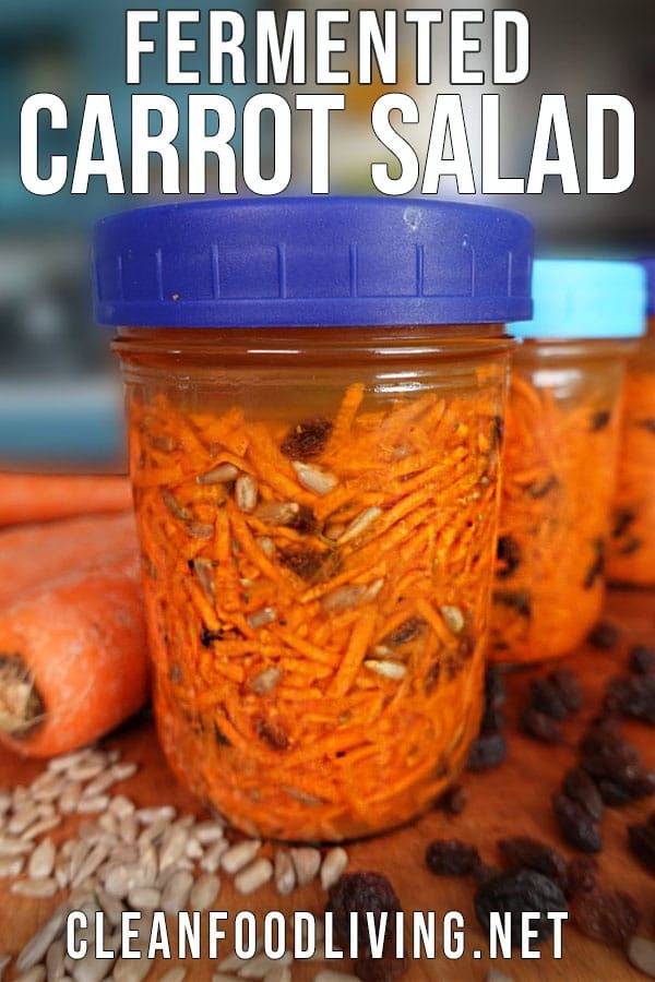 carrots and other vegetables are in jars with the words fermented carrot salad