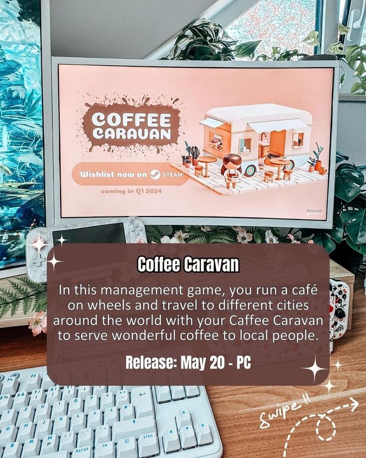 coffee caravan advertisement on computer screen next to keyboard