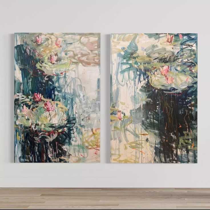 two paintings are hanging on the wall next to each other in an empty room with wood flooring