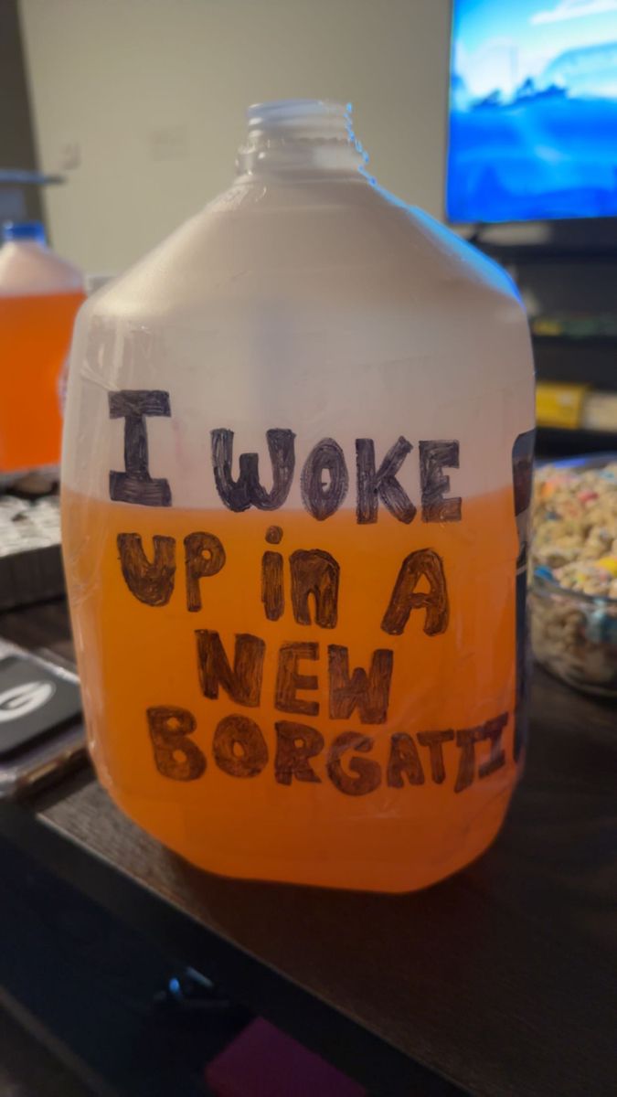 a plastic jug with writing on it that says i woke up in a new borrate