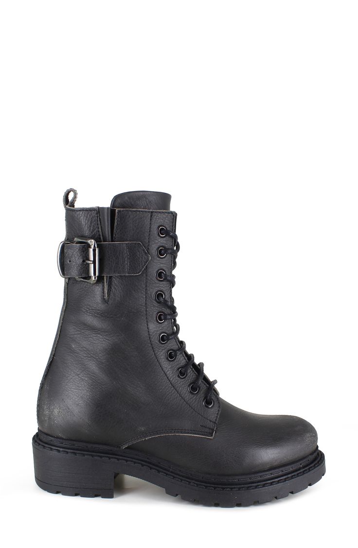 A thick buckle strap punctuates the side of an edgy side-zip combat boot crafted from rich leather and grounded by a chunky lug sole. 1 1/2" heel; 1/2" platform 8 1/2" shaft Leather upper and lining/rubber sole Made in Italy Leather Combat Ankle Boots, Leather Combat Boots For Fall, Leather High Ankle Combat Boots, Punk Leather Lace-up Boots With Lug Sole, Punk Style Leather Lace-up Boots With Buckle Closure, Edgy Leather Ankle Combat Boots, Edgy Leather Mid-calf Boots With Lug Sole, Leather Lace-up Boots With Buckle Closure, Womens Combat Boots