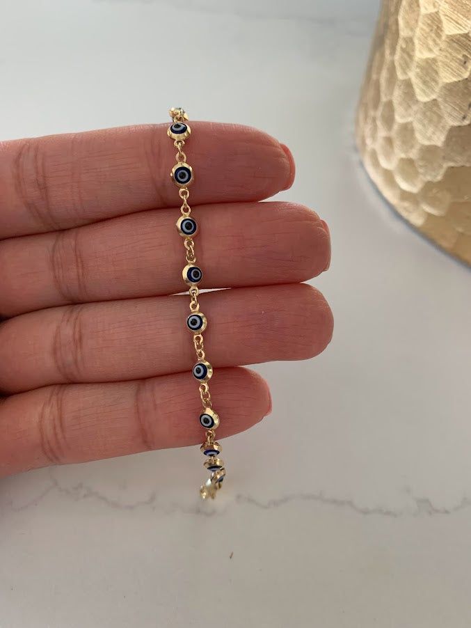 Oval Evil Eye Bracelet Sterling Silver Evil Eye Bracelet – YanYa Evil Eye Gold Bracelet, Evil Eye Bracelet Silver, Evil Eye Bracelet Gold, Silver Evil Eye Bracelet, Blue Evil Eye Bracelet, Gold Evil Eye Bracelet, Silver Anklets Designs, Angel Bracelet, Bracelet Evil Eye