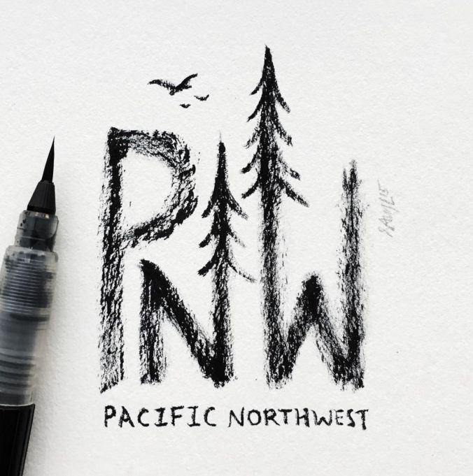 a pen is sitting on top of a piece of paper with the words pacific northwest written in it