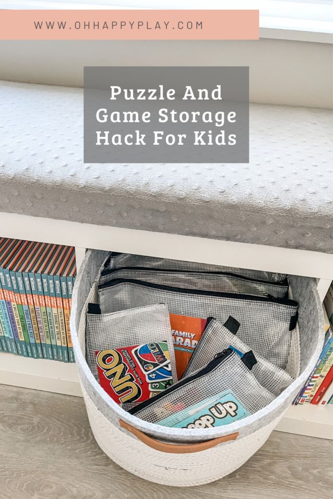 a storage bin filled with games and snacks for kids to play in the living room