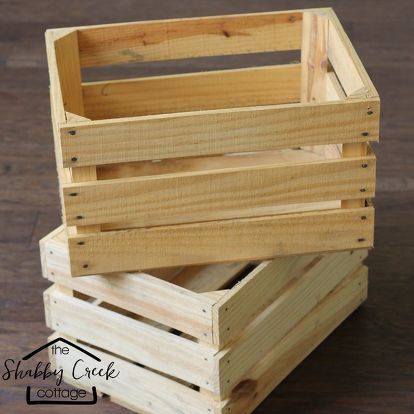 three wooden crates stacked on top of each other