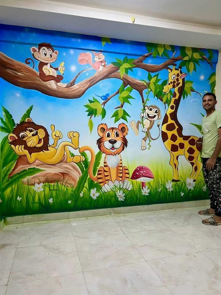 a man standing in front of a mural depicting animals