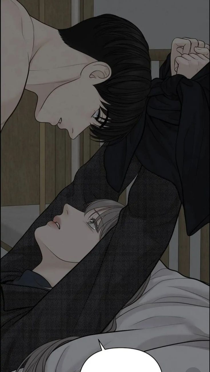 an anime scene with two people laying on the bed and one is holding his head