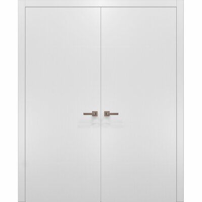 an open white cabinet with two doors and handles on the front, side by side