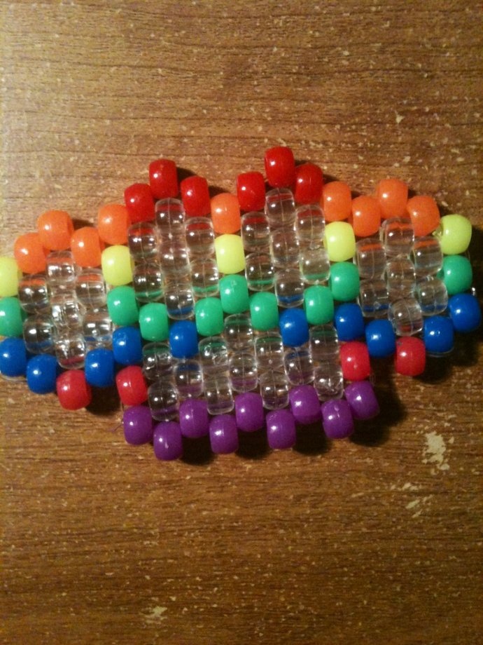 the beads are arranged on top of each other in order to make it look like they have been made out of plastic