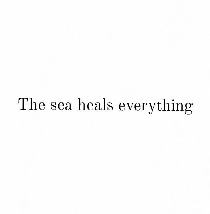 the sea heals everything quote on white background with black text overlaying it