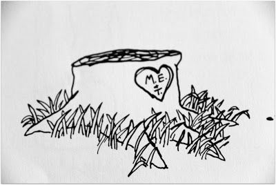 a black and white drawing of a heart in the grass