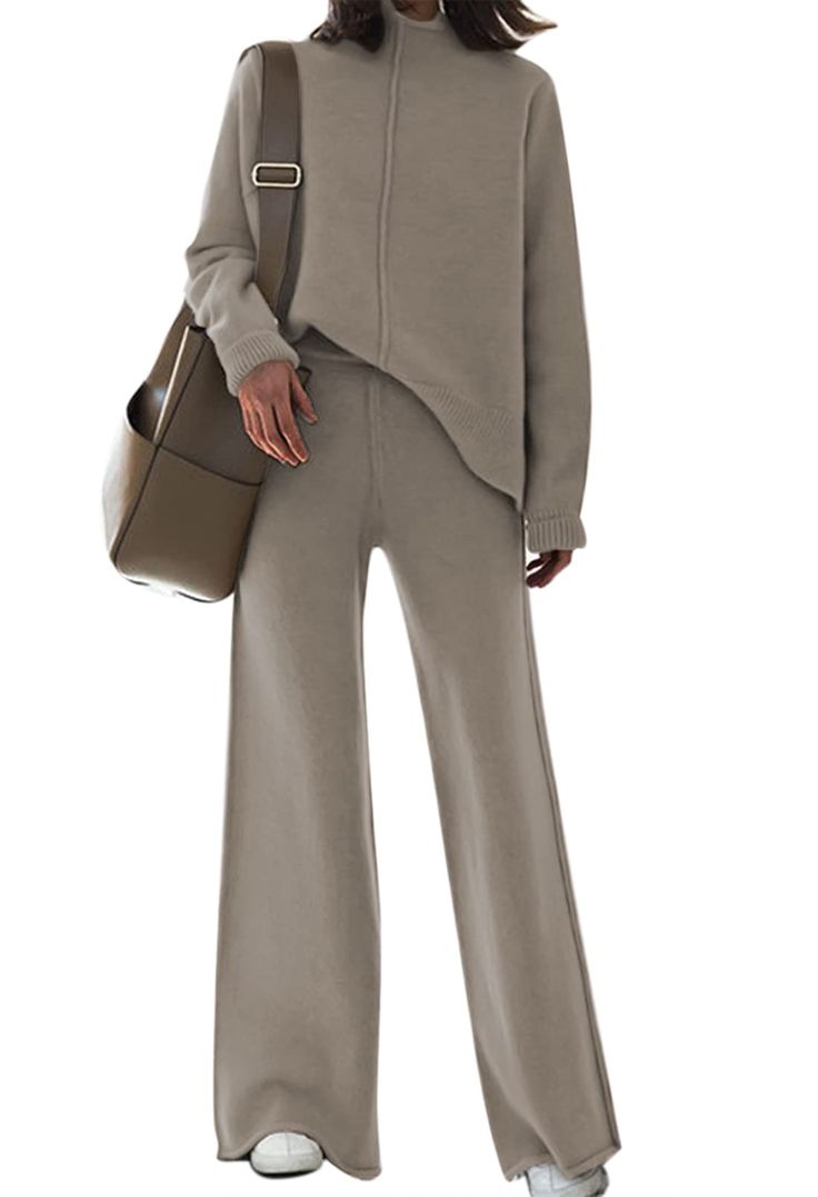 PRICES MAY VARY. Two piece knit outfits for women, turtleneck long sleeve pullover top and elastic waist wide leg pants Crafted from a high quality soft knit fabric, this cozy 2 piece matching set provides ultimate comfort and effortless style Stay warm and stylish in this long sleeve turtleneck pullover sweater, ribbed hem with side slit adds a unique detail This wide leg pants set features elastic waist and relaxed fit, making it a great choice for all body types Suitable for casual wear at home, lounge, work, travel, streetwear, hang out, vacation and more VamJump Women's 2 Piece Outfits Lounge Sets Long Sleeve High Neck Sweater Pullover Top Wide Leg Pants Sweatsuit Sets Size: S(US 4-6): Bust: 36.22"--Waist: 29.92"--Hips: 37.40"--Top Length: 24.41"--Sleeve Length: 23.23" M(US 8-10): Bus Knitted Outfits For Women, Sweater Lounge Set, Knit Lounge Set, Knit Sweater Outfit, Tracksuit Outfit, Pullover Outfit, Set Outfits, Sweatsuit Set, High Neck Sweater