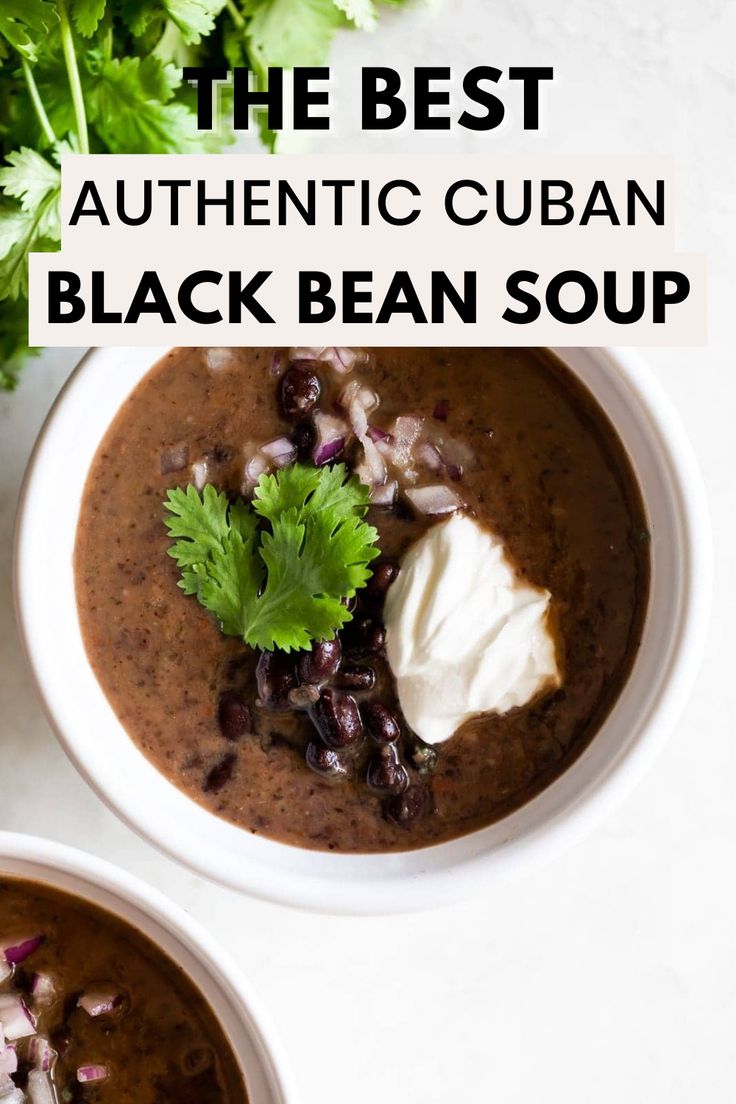 A white bowl of sopa de frijol negro topped with sour cream, onions, and a cilantro leaf and the words "the best authentic cuban black bean soup" in the foreground