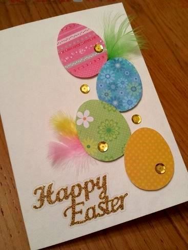 a close up of a greeting card on a wooden table with an easter egg design