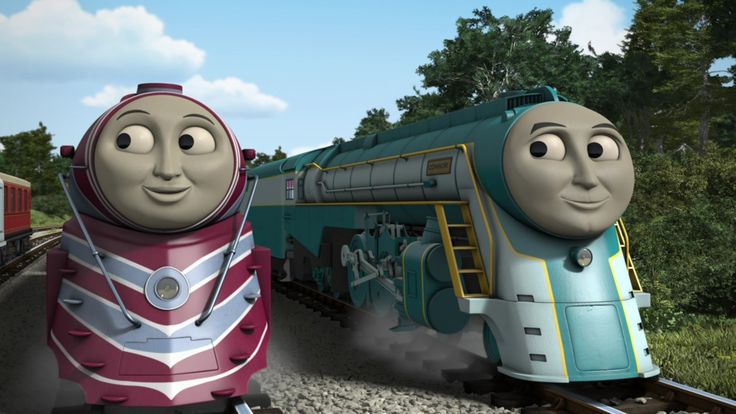 thomas the tank engine and his friends are riding on train tracks