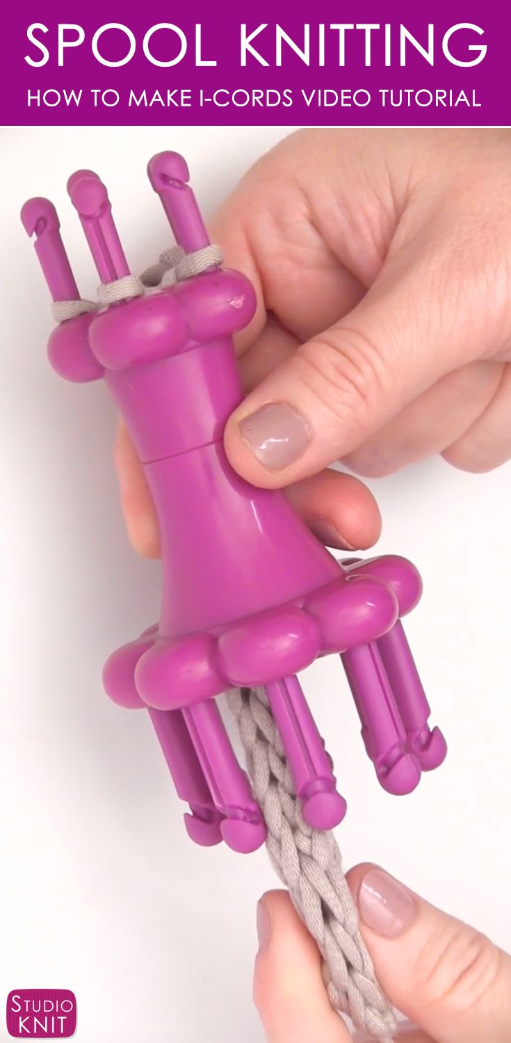 someone is holding a purple toy in their hand with the text spool knitting how to make