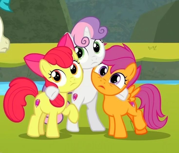 three little ponys standing next to each other