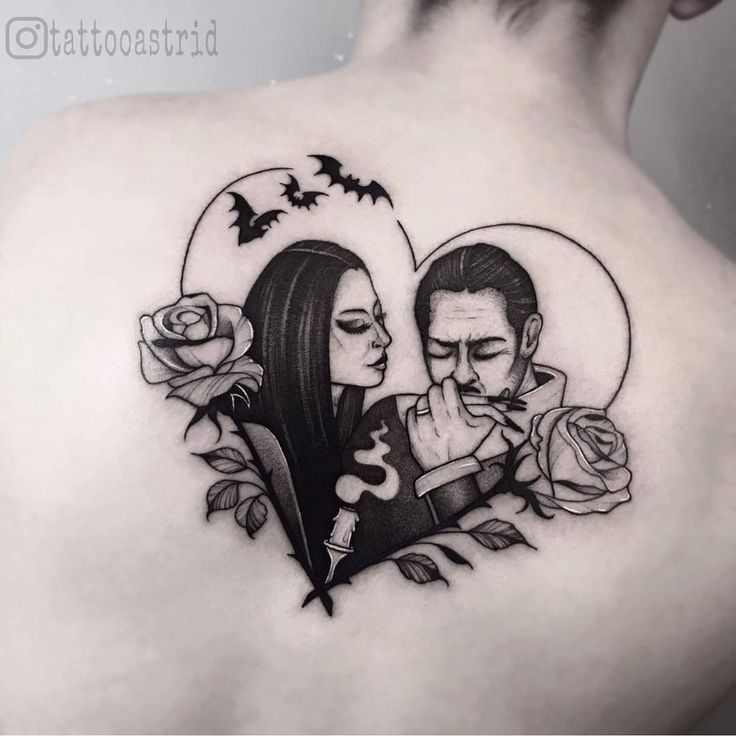 a man and woman with roses on their back shoulder, one is holding the other's hand