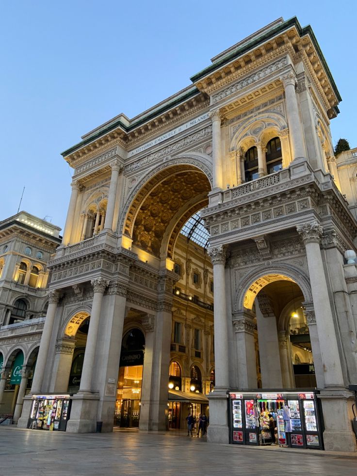 an ornate building with columns and arches