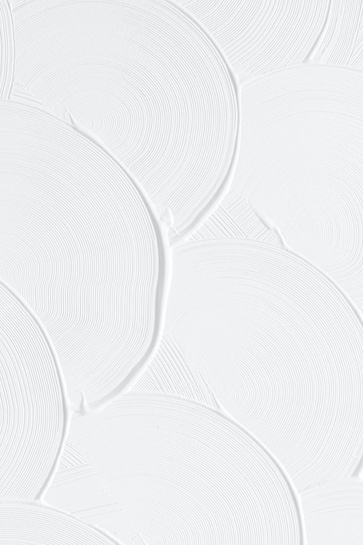 an abstract white wallpaper with circles and lines in the center, on top of it