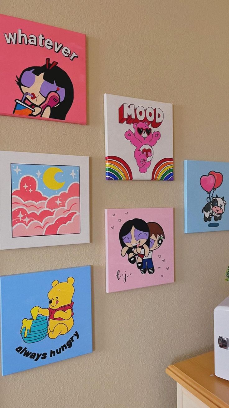 there are many cartoon pictures on the wall