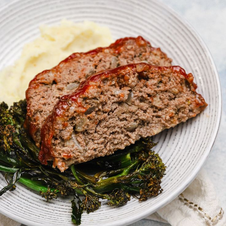 meatloaf, mashed potatoes and broccoli on a plate