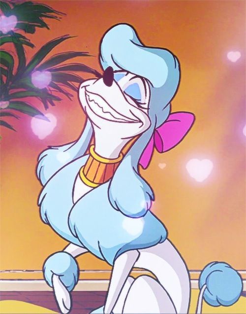 an image of a cartoon character with blue hair and pink ears, sitting in front of a palm tree