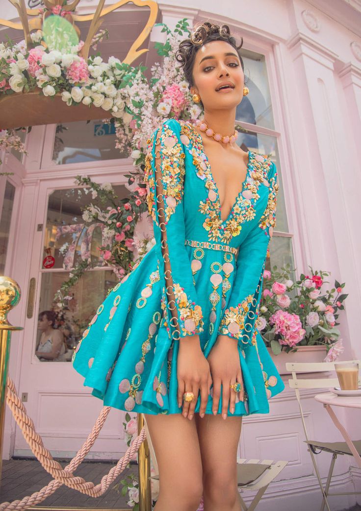 Editor's Note A Cerulean Raw Silk Babydoll Dress Embroidered With Glass Stones, Gold Metal Pieces, Glass Cut Beads And Reflective Sequins And Statement Sleeves. It Is Paired With An Embroidered... Papa Don't Preach, Silk Babydoll, Blue Babydoll Dress, Mehendi Outfits, Sequin Sleeve, Statement Sleeves, Cerulean Blue, Indian Fashion Dresses, Indo Western